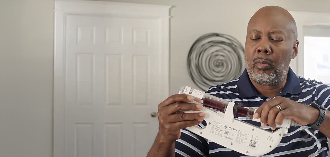 Arthur, a patient advocate, living with CIDP,  with infusion kit
