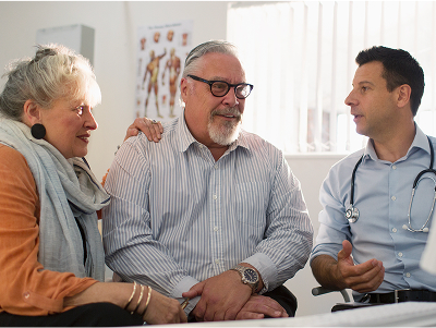 A couple talking to a doctor about CIDP diagnosis