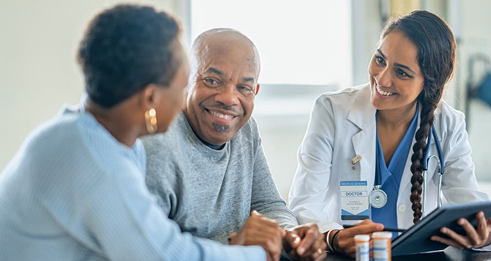 A couple talking to a doctor about CIDP diagnosis