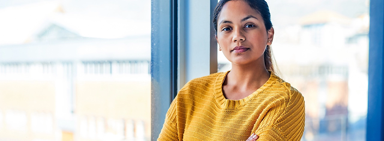 Woman in a yellow sweater