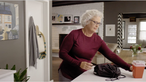 Melaine, a patient advocate preparing to self-infuse in her home