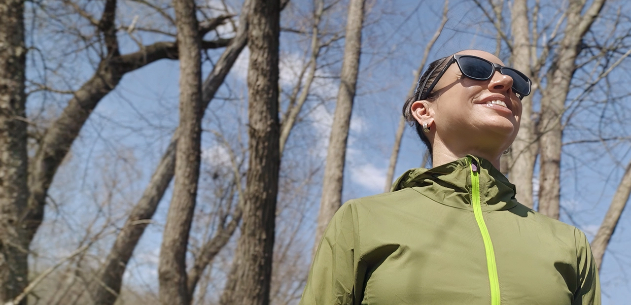 Angela, a patient advocate on Hizentra, walking outdoors