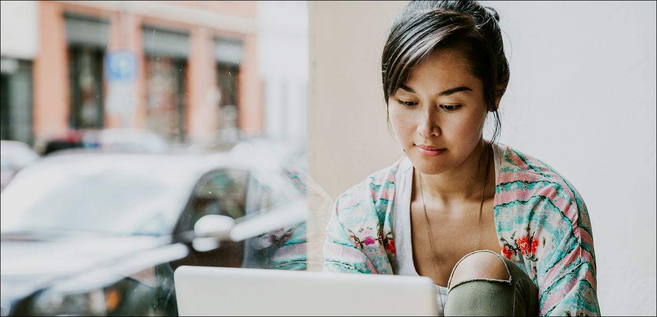 Woman researching on laptop
